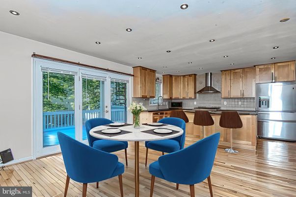 Dining room, Interior, Kitchen, Recessed Lighting, Stainless Steel Appliances, Wood Texture Flooring
