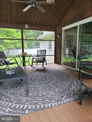 Exterior, Interior, Sun Room, Wood Texture Flooring