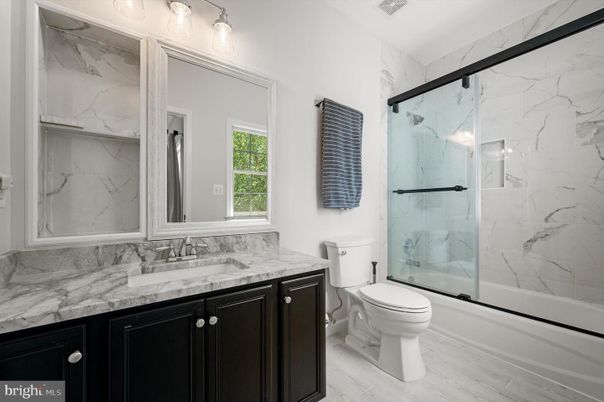 Bathroom, Glass Shower, Interior, Marble Walls, Wood Texture Flooring