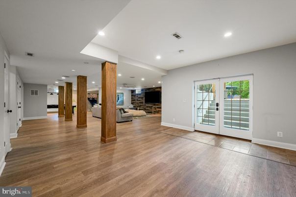 Empty room, Fireplace, Interior, Recessed Lighting, Stone Walls, Wood Texture Flooring