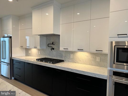 Interior, Kitchen, Marble, Marble Walls, Recessed Lighting, Stainless Steel Appliances