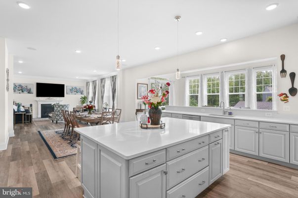 Dining room, Fireplace, Interior, Kitchen, Pendant Lights, Recessed Lighting, Wood Texture Flooring