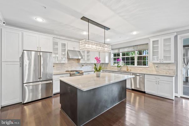Chandelier, Interior, Kitchen, Recessed Lighting, Stainless Steel Appliances, Wood Texture Flooring