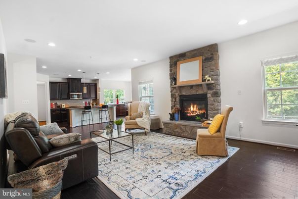 Fireplace, Interior, Kitchen, Living room, Recessed Lighting, Stone Walls, Wood Texture Flooring