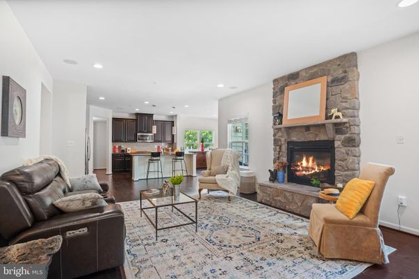 Fireplace, Interior, Kitchen, Living room, Recessed Lighting, Stone Walls, Wood Texture Flooring