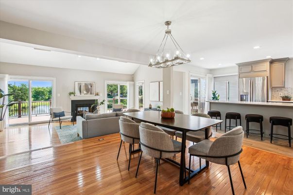 Dining room, Fireplace, Interior, Kitchen, Living room, Pendant Lights, Recessed Lighting, Stainless Steel Appliances, Wood Texture Flooring
