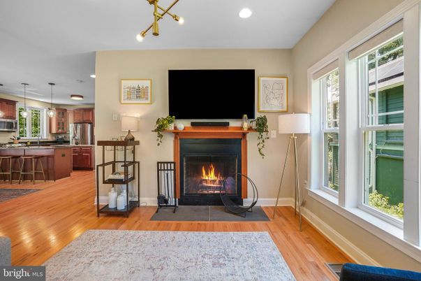 Fireplace, Interior, Kitchen, Pendant Lights, Recessed Lighting, Stainless Steel Appliances, Wood Texture Flooring