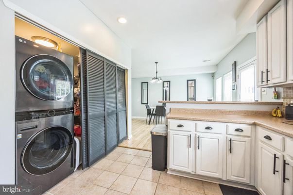 Dining room, Interior, Pendant Lights, Recessed Lighting, Washer, Wood Texture Flooring