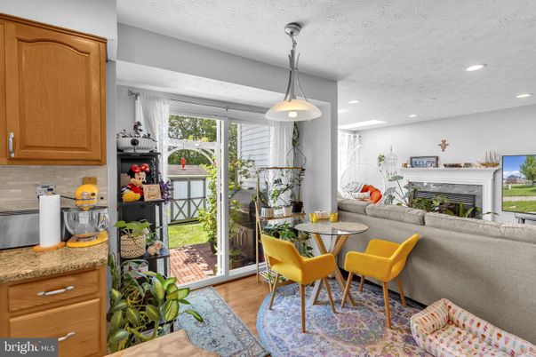Dining room, Fireplace, Interior, Pendant Lights, Recessed Lighting, Wood Texture Flooring
