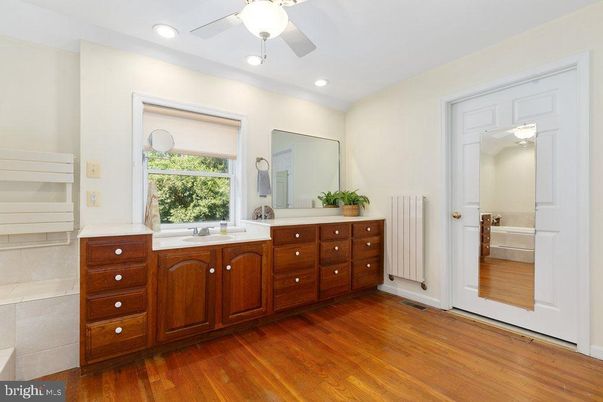 Bathroom, Dual Sink Vanities, Interior, Recessed Lighting, Wood Texture Flooring