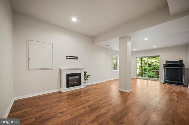 Empty room, Fireplace, Interior, Recessed Lighting, Wood Texture Flooring