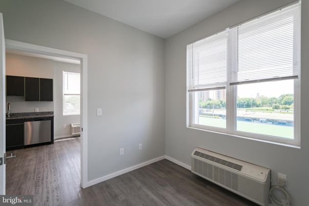 Empty room, Interior, Kitchen, Stainless Steel Appliances, Wood Texture Flooring
