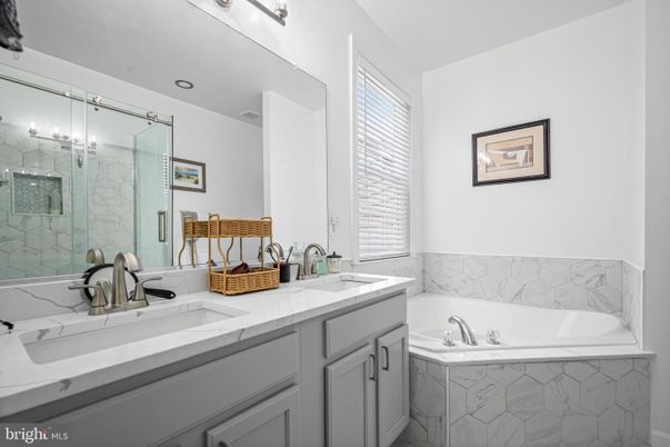Bathroom, Dual Sink Vanities, Glass Shower, Interior, Marble Walls, Recessed Lighting