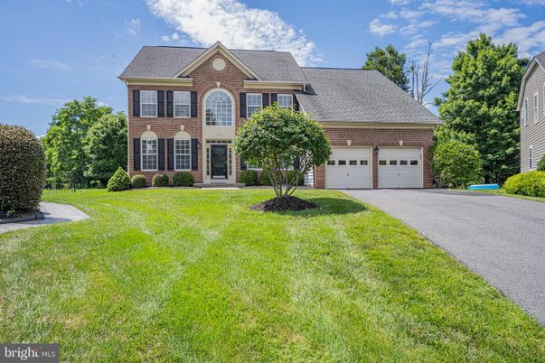 Attached, Exterior, Facade, Brick Facade, French Provincial