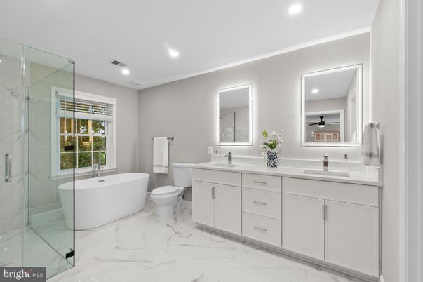 Bathroom, Dual Sink Vanities, Free Standing Baths, Glass Shower, Interior, Marble, Marble Walls, Recessed Lighting