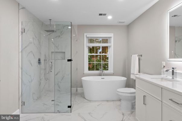 Bathroom, Free Standing Baths, Glass Shower, Interior, Marble, Marble Walls, Recessed Lighting