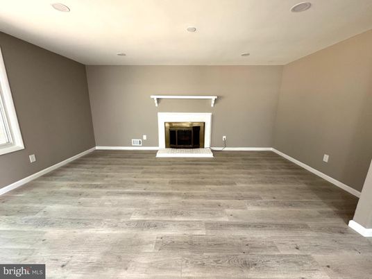 Empty room, Fireplace, Interior, Recessed Lighting, Wood Texture Flooring