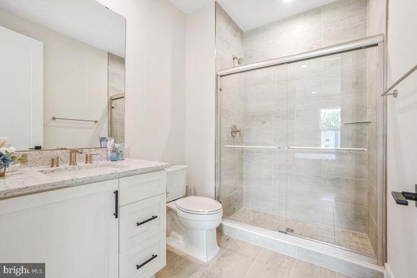 Bathroom, Glass Shower, Interior, Recessed Lighting, Wood Texture Flooring