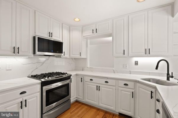 Interior, Kitchen, Marble Walls, Recessed Lighting, Wood Texture Flooring