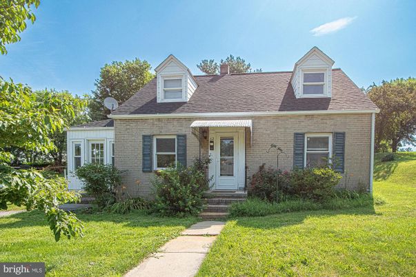 Exterior, Facade, Brick Facade, Cape Cod