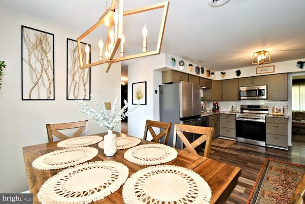 Dining room, Interior, Kitchen, Pendant Lights, Stainless Steel Appliances, Wood Texture Flooring