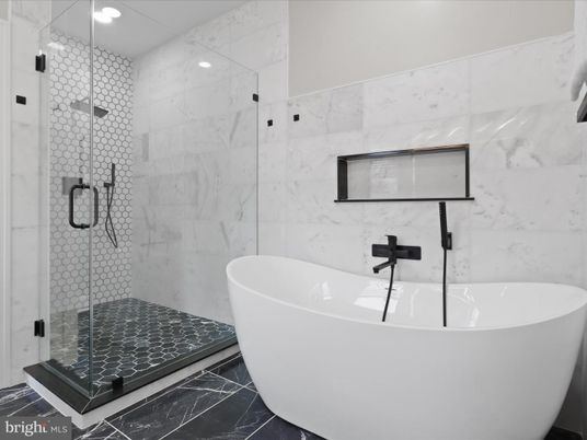 Bathroom, Free Standing Baths, Glass Shower, Interior, Marble, Marble Walls, Recessed Lighting