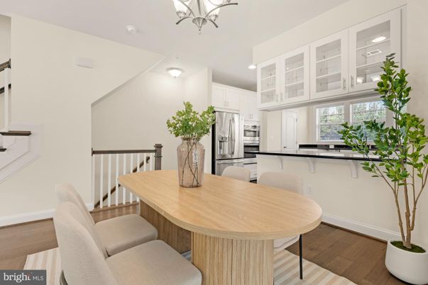 Chandelier, Dining room, Interior, Kitchen, Recessed Lighting, Stainless Steel Appliances, Wood Texture Flooring