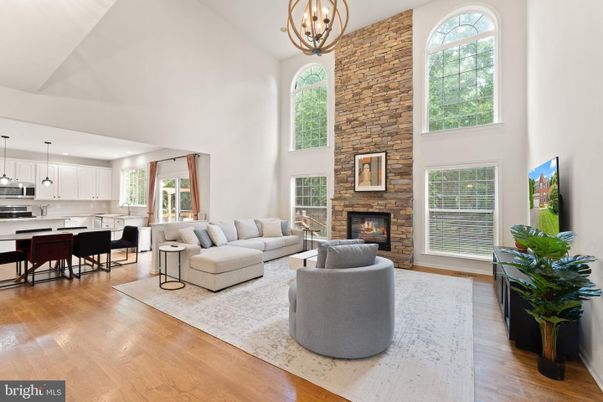Dining room, Fireplace, Interior, Kitchen, Living room, Pendant Lights, Stone Walls, Wood Texture Flooring