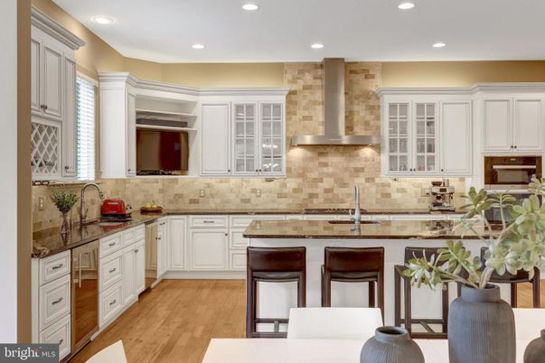 Interior, Kitchen, Recessed Lighting, Stainless Steel Appliances, Stone Walls, Wood Texture Flooring