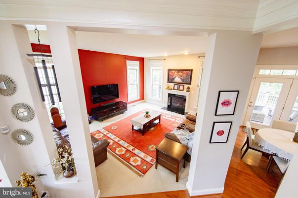 Dining room, Fireplace, Interior, Living room, Recessed Lighting, Wood Texture Flooring