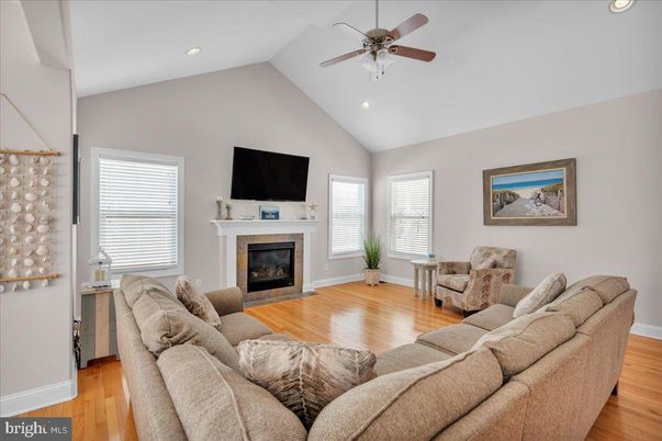 Fireplace, Interior, Living room, Recessed Lighting, Wood Texture Flooring
