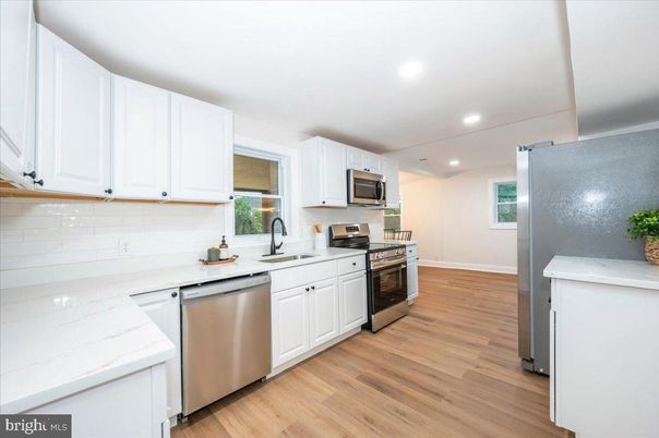 Interior, Kitchen, Recessed Lighting, Stainless Steel Appliances, Wood Texture Flooring