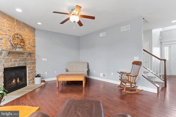 Fireplace, Interior, Recessed Lighting, Stone Walls, Wood Texture Flooring