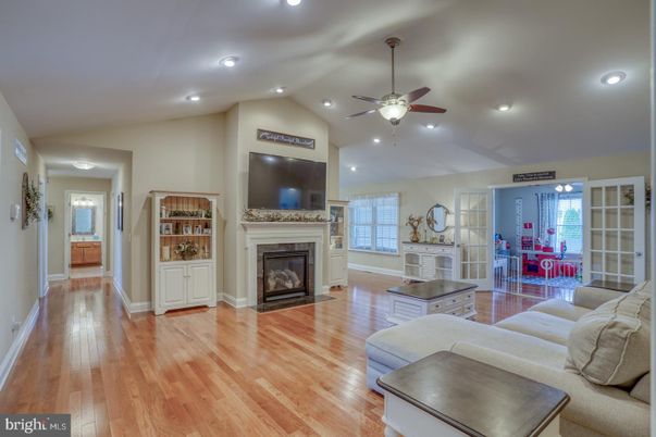 Fireplace, Interior, Living room, Recessed Lighting, Wood Texture Flooring