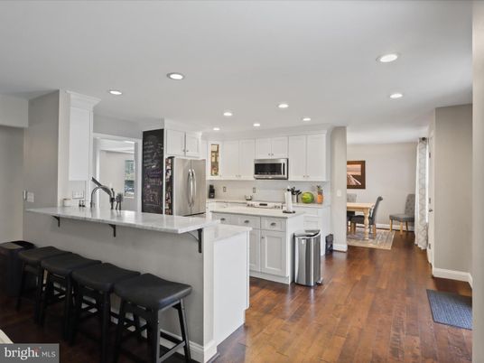 Dining room, Interior, Kitchen, Recessed Lighting, Stainless Steel Appliances, Wood Texture Flooring