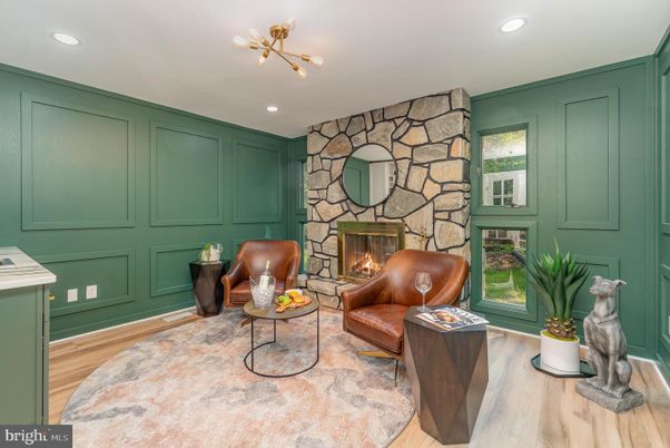 Fireplace, Interior, Living room, Recessed Lighting, Stone Walls, Wood Texture Flooring