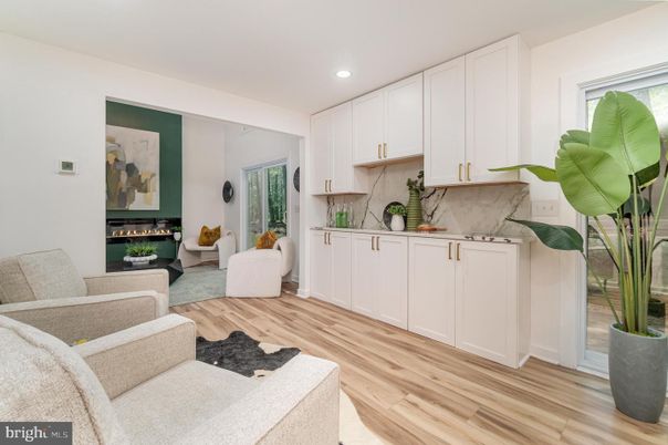 Fireplace, Interior, Living room, Marble Walls, Recessed Lighting, Wood Texture Flooring
