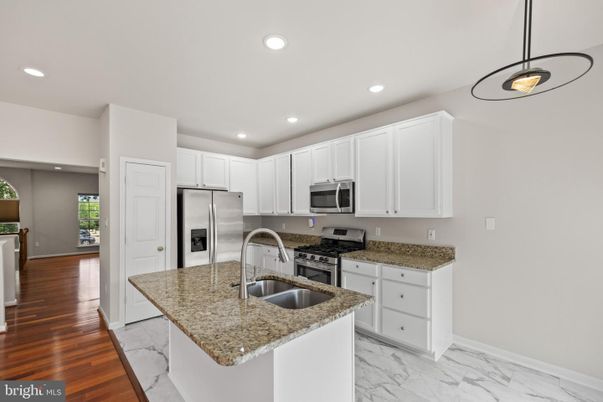 Interior, Kitchen, Marble, Pendant Lights, Recessed Lighting, Stainless Steel Appliances