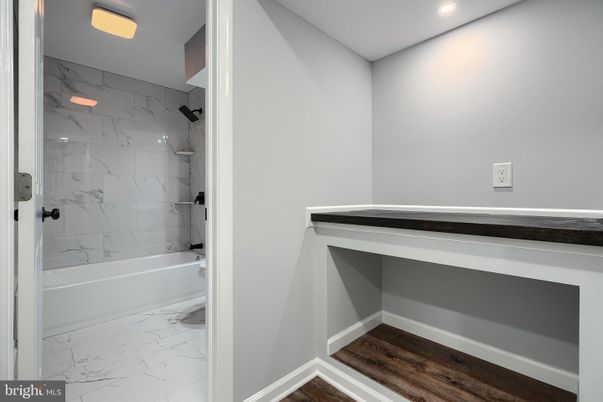 Bathroom, Interior, Marble, Marble Walls, Recessed Lighting, Wood Texture Flooring