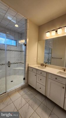 Bathroom, Dual Sink Vanities, Glass Shower, Interior, Marble, Recessed Lighting