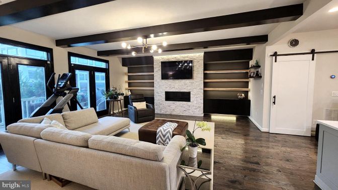 Fireplace, Interior, Living room, Recessed Lighting, Stone Walls, Wooden Beams, Wood Texture Flooring