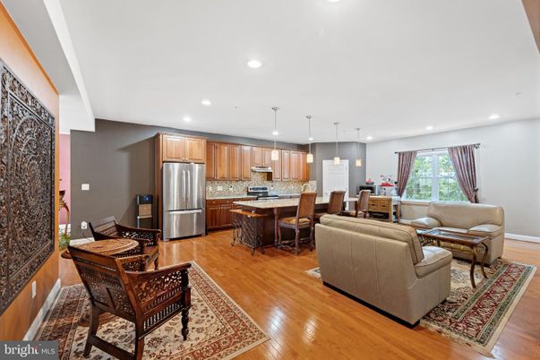 Dining room, Interior, Kitchen, Living room, Pendant Lights, Recessed Lighting, Stainless Steel Appliances, Wood Texture Flooring