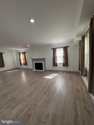 Empty room, Fireplace, Interior, Recessed Lighting, Wood Texture Flooring