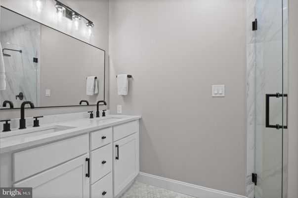 Bathroom, Dual Sink Vanities, Glass Shower, Interior, Marble Walls