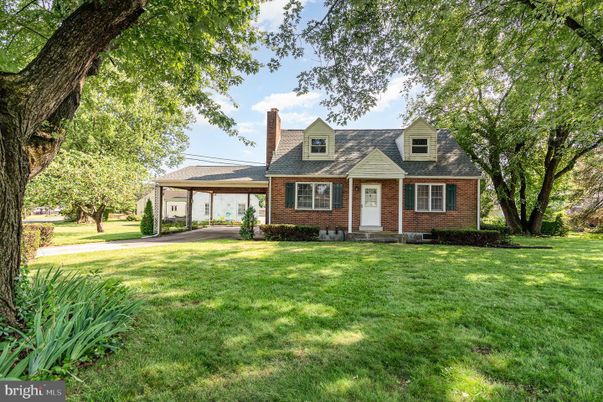 Attached, Exterior, Facade, Brick Facade, Cape Cod