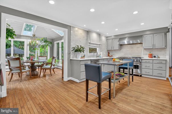 Dining room, Interior, Kitchen, Recessed Lighting, Stainless Steel Appliances, Wood Texture Flooring