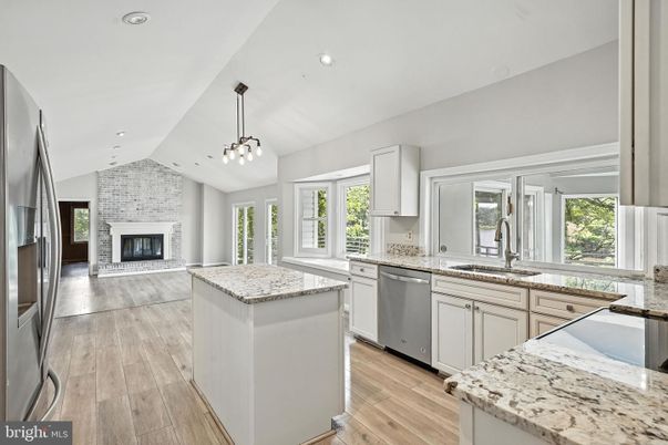 Fireplace, Interior, Kitchen, Pendant Lights, Recessed Lighting, Stone Walls, Wood Texture Flooring