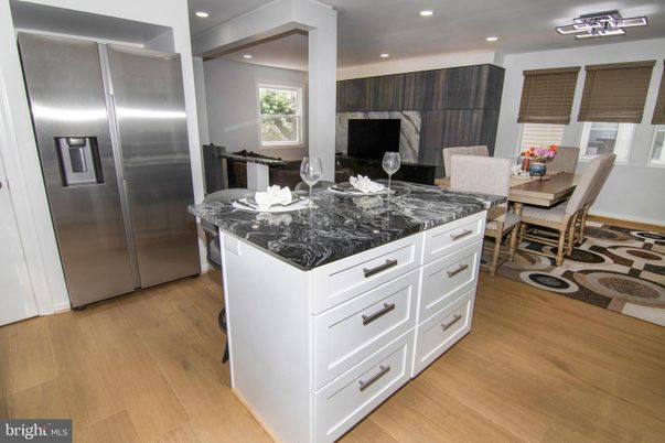 Dining room, Interior, Kitchen, Recessed Lighting, Stainless Steel Appliances, Wood Texture Flooring