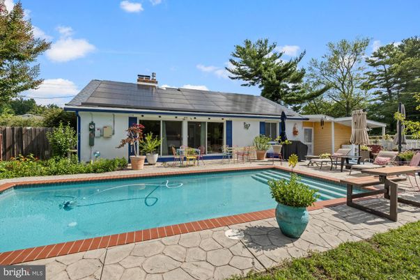 Exterior, Pool, Solar Panels