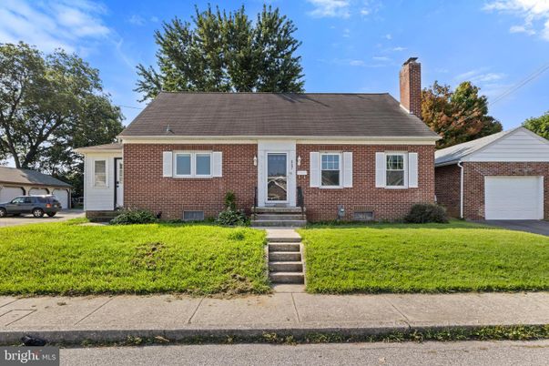 Attached, Exterior, Facade, Brick Facade, Cape Cod